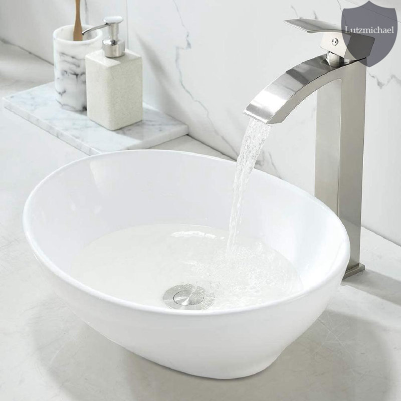 Menggutong 13'' White Ceramic Oval Vessel Bathroom Sink with Faucet